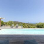 Porto-Vecchio, Santa Giulia, villa d’architecte, 4 chambres, piscine, vue mer, proche plage