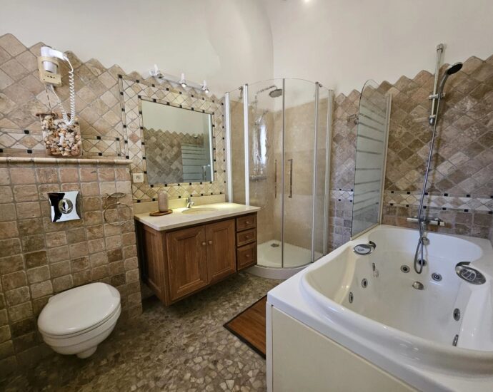 Exceptional, in the Cala Rossa area, 2 semi-detached villas, waterfront